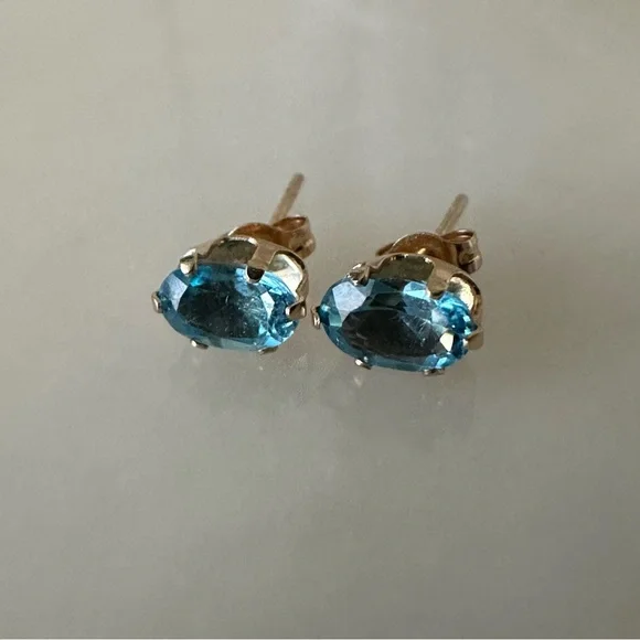 14k Solid Gold Blue Topaz Oval Post Earrings - Picture 2 of 13